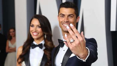 CristianoRonaldoandGeorginaRodriguezposingtogetherataformaleventwithGeorgina MindViewMagazinecom Cristiano Ronaldo and Georgina Rodriguez posing together at a formal event with Georgina showing her engagement ring