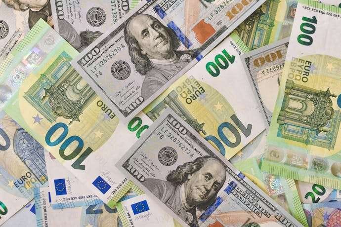 Photo by Ibrahim Boran MindViewMagazinecom A detailed view of American and Euro currency notes emphasizing global finance