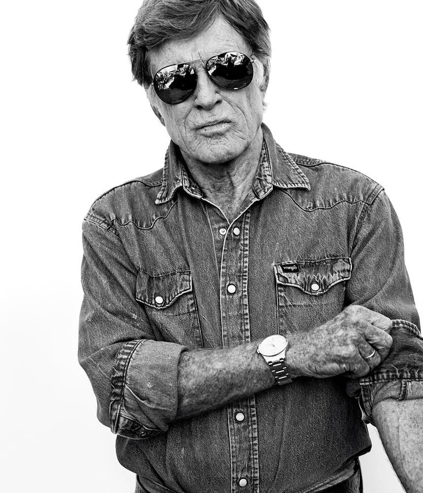 image MindViewMagazinecom Black and white vintage portrait of a man in a denim shirt with rolled up sleeves and a metal watch evoking a classic Americana style
